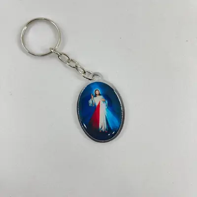 Chaveiro Oval Dupla Face Aparecida e Jesus Misericordioso