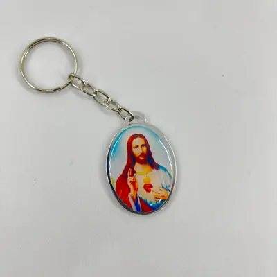 Chaveiro Oval Dupla Face Coração de Jesus e Coração de Maria