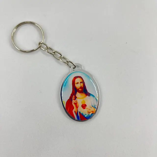 Chaveiro Oval Dupla Face Coração de Jesus e Coração de Maria