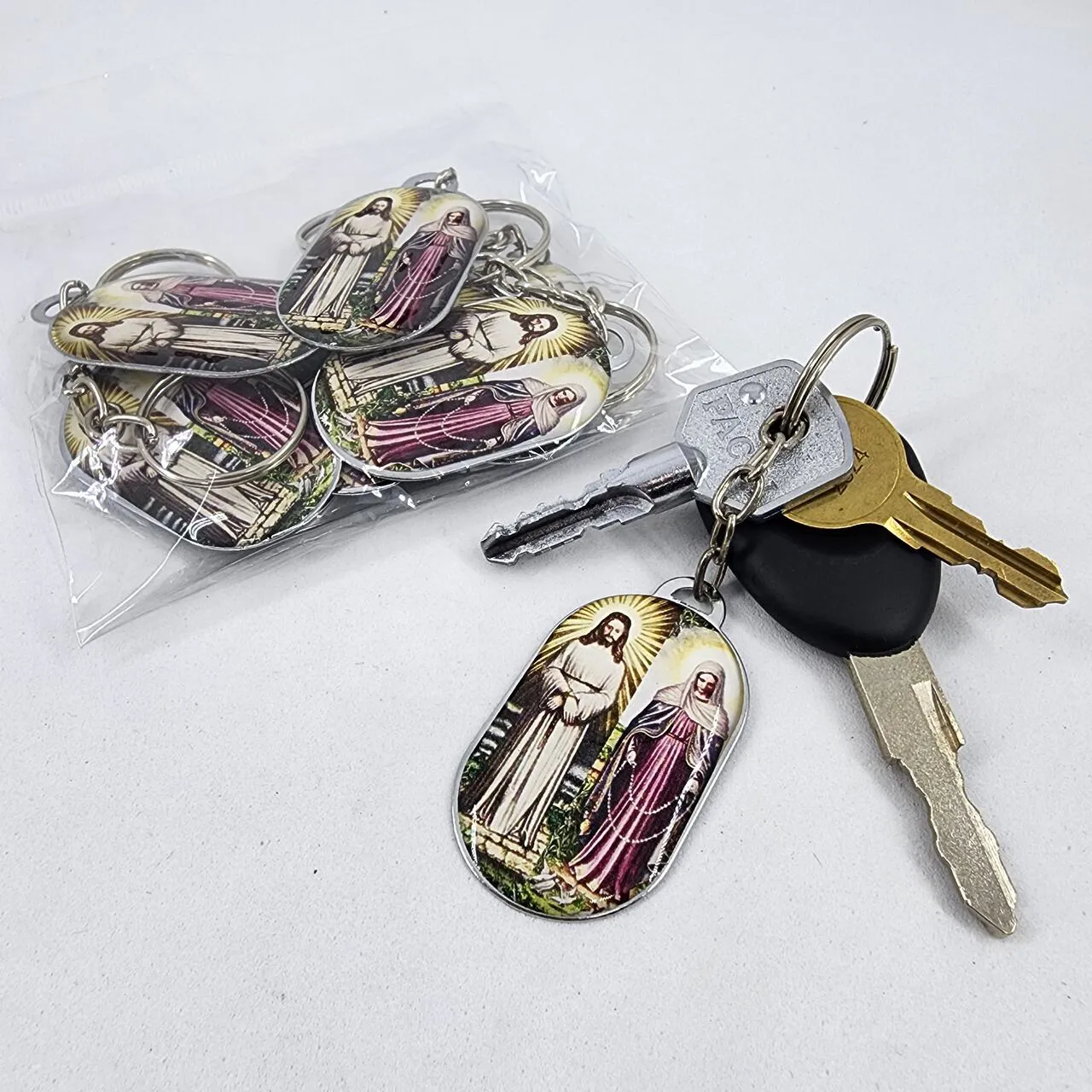 Chaveiro Plaqueta Nossa Senhora das Lágrimas, Pacote com 10